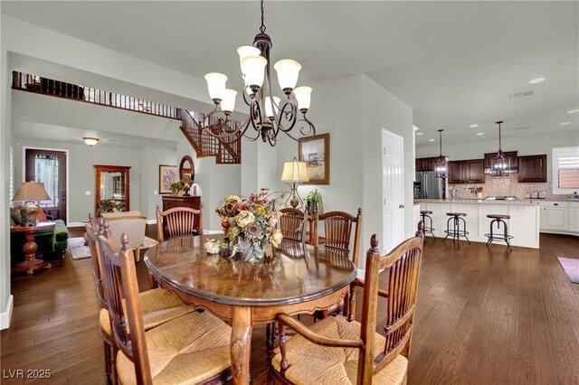 326 Caneflower Ct, North Las Vegas, NV 89031 - dining room with a chandelier, dark wood-type flooring, and recessed lighting
