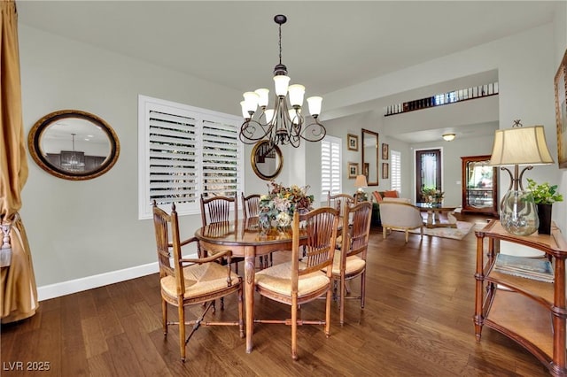 326 Caneflower Ct, North Las Vegas, NV 89031 - dining area with a chandelier and dark wood-type flooring