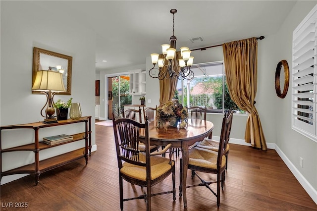 326 Caneflower Ct, North Las Vegas, NV 89031 - dining area with a chandelier, dark wood-type flooring, and recessed lighting