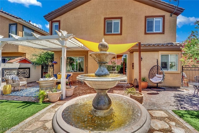 326 Caneflower Ct, North Las Vegas, NV 89031 - rear view of property with a patio, stucco siding, a pergola, and a tile roof