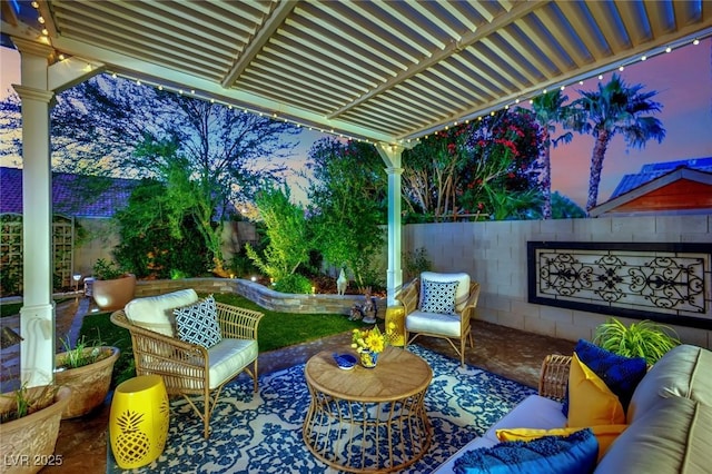 326 Caneflower Ct, North Las Vegas, NV 89031 - patio terrace at dusk with outdoor lounge area, a patio, and a fenced backyard
