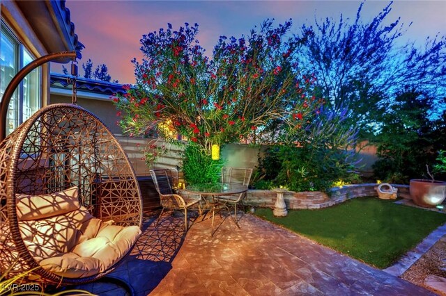 326 Caneflower Ct, North Las Vegas, NV 89031 - fenced backyard with a patio area