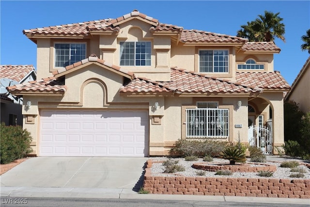 8982 Emerald Waters Ct, Las Vegas, NV 89147 - mediterranean / spanish home with concrete driveway, a tiled roof, and stucco siding