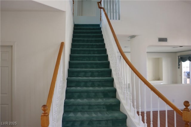 8982 Emerald Waters Ct, Las Vegas, NV 89147 - stairway featuring wood finished floors