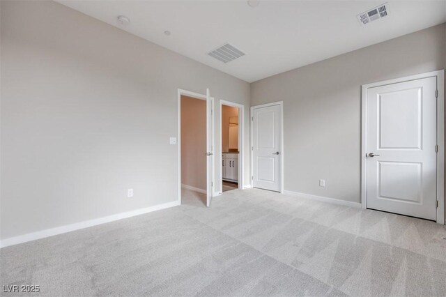 11922 Glide Reflection Ave, Las Vegas, NV 89138 - unfurnished bedroom with light colored carpet and baseboards