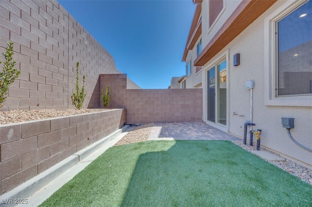11922 Glide Reflection Ave, Las Vegas, NV 89138 - fenced backyard featuring a patio