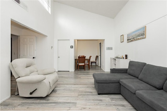 4232 Park Ct, Las Vegas, NV 89110 - living area featuring a towering ceiling and light wood finished floors
