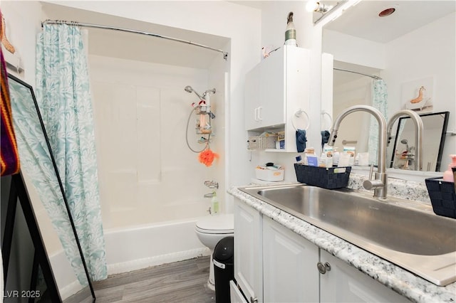 4232 Park Ct, Las Vegas, NV 89110 - full bath with vanity, shower / bathtub combination with curtain, and wood finished floors