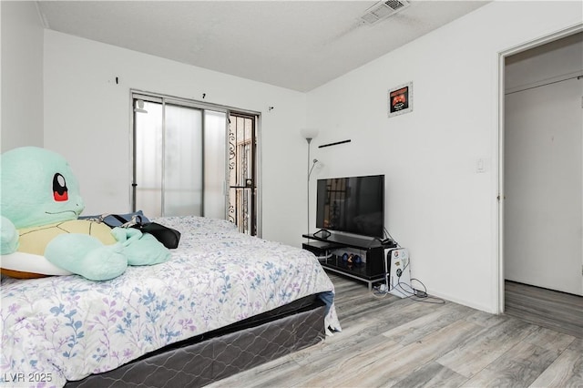 4232 Park Ct, Las Vegas, NV 89110 - bedroom featuring wood finished floors