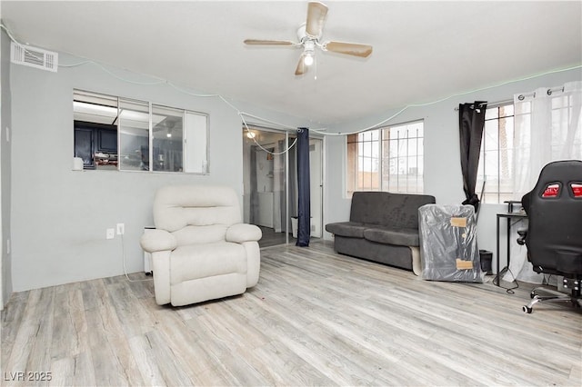 4232 Park Ct, Las Vegas, NV 89110 - living room featuring wood finished floors and a ceiling fan
