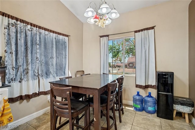 2716 Orchid Moon Ct, North Las Vegas, NV 89031 - dining room with a chandelier and light tile patterned floors
