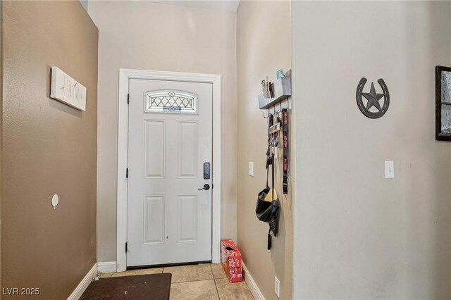 2716 Orchid Moon Ct, North Las Vegas, NV 89031 - foyer featuring baseboards and light tile patterned floors