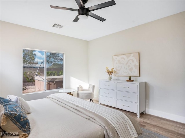 4314 Livorno Ave, Las Vegas, NV 89141 - bedroom with light wood-type flooring and ceiling fan