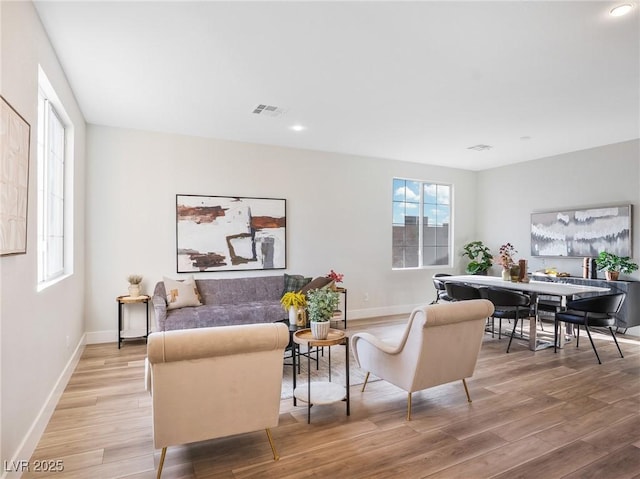 4314 Livorno Ave, Las Vegas, NV 89141 - living area featuring light wood-style flooring and recessed lighting