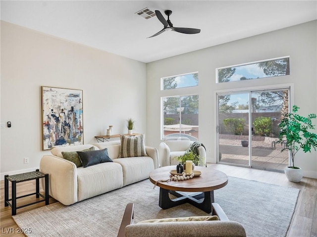 4314 Livorno Ave, Las Vegas, NV 89141 - living area with a ceiling fan and wood finished floors