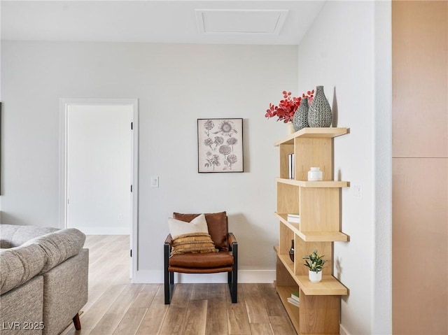 4314 Livorno Ave, Las Vegas, NV 89141 - sitting room featuring attic access and light wood-type flooring