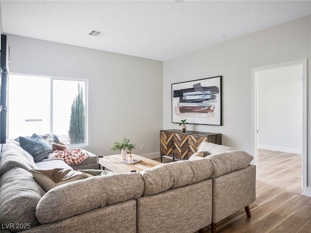 4314 Livorno Ave, Las Vegas, NV 89141 - living room featuring wood finished floors and baseboards