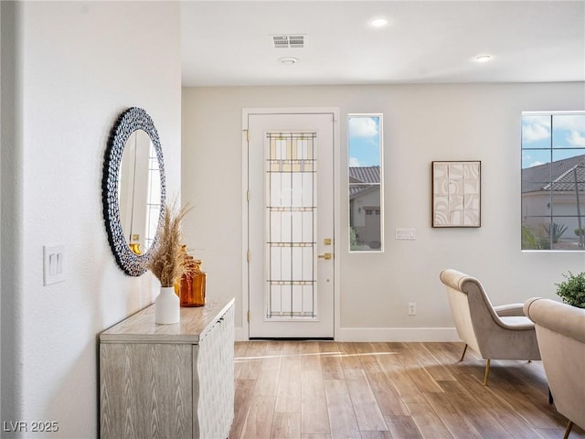 4314 Livorno Ave, Las Vegas, NV 89141 - foyer with light wood finished floors and recessed lighting
