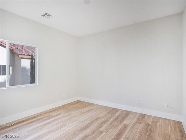 4314 Livorno Ave, Las Vegas, NV 89141 - spare room with wood finished floors and baseboards