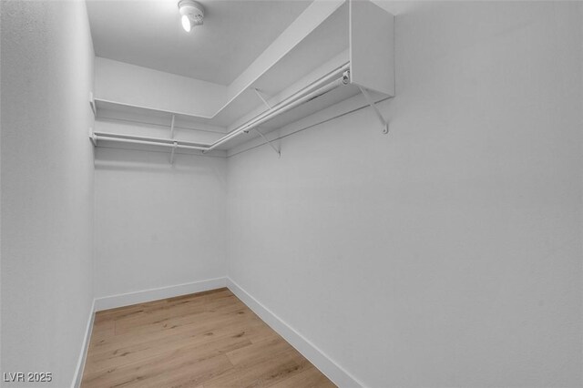 363 El Pico Dr, Henderson, NV 89014 - spacious closet with light wood-style floors