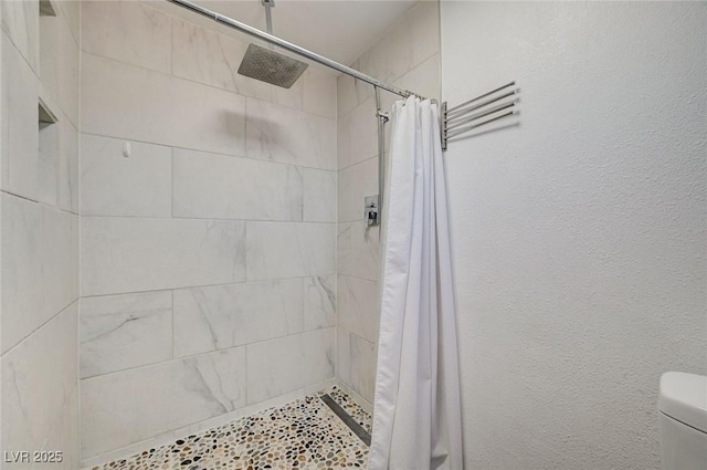 3917 Leon Ave, Las Vegas, NV 89130 - full bathroom featuring a tile shower and toilet