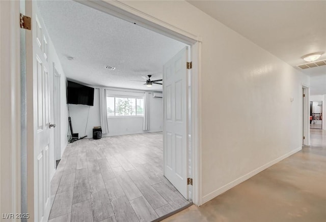 3917 Leon Ave, Las Vegas, NV 89130 - hall featuring baseboards and an AC wall unit