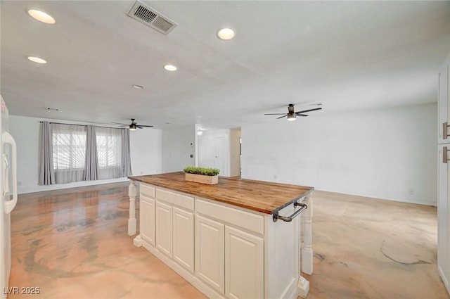3917 Leon Ave, Las Vegas, NV 89130 - kitchen featuring ceiling fan, open floor plan, wooden counters, and recessed lighting