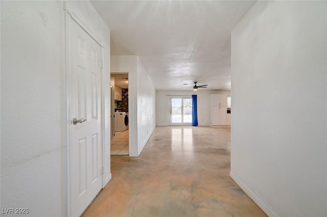 3917 Leon Ave, Las Vegas, NV 89130 - corridor with washer / dryer and concrete floors