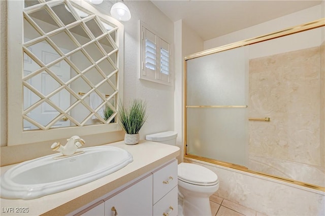 2808 Crown Ridge Dr, Las Vegas, NV 89134 - full bath featuring vanity, bath / shower combo with glass door, and tile patterned flooring