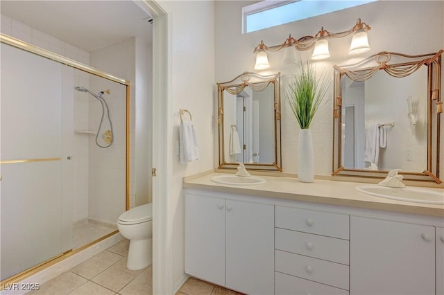 2808 Crown Ridge Dr, Las Vegas, NV 89134 - bathroom with a stall shower, double vanity, and tile patterned flooring