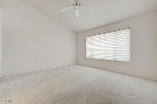 2808 Crown Ridge Dr, Las Vegas, NV 89134 - carpeted empty room featuring vaulted ceiling and a ceiling fan