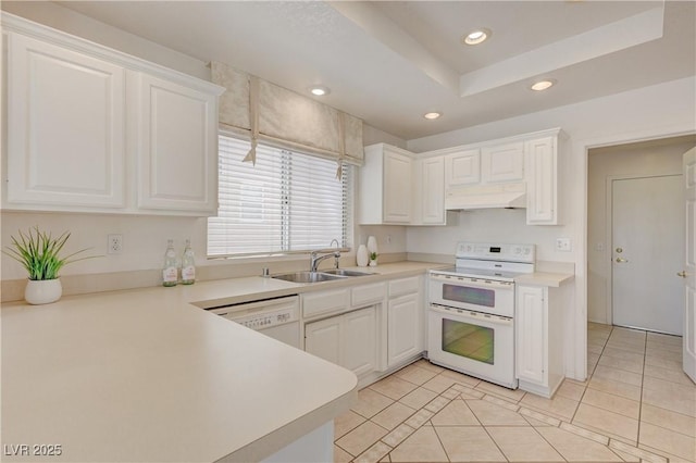2808 Crown Ridge Dr, Las Vegas, NV 89134 - kitchen featuring white appliances, under cabinet range hood, white cabinets, light tile patterned flooring, and recessed lighting