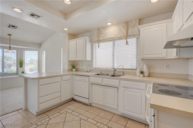2808 Crown Ridge Dr, Las Vegas, NV 89134 - kitchen with white appliances, a peninsula, light tile patterned floors, white cabinets, and light countertops