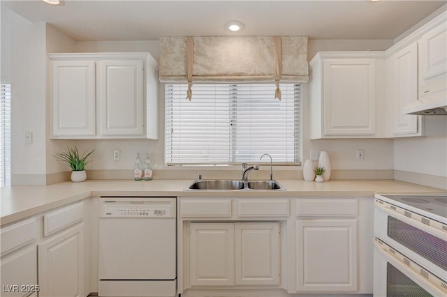 2808 Crown Ridge Dr, Las Vegas, NV 89134 - kitchen featuring white appliances, white cabinets, light countertops, and recessed lighting