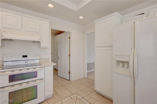 2808 Crown Ridge Dr, Las Vegas, NV 89134 - kitchen featuring white appliances, under cabinet range hood, white cabinetry, light tile patterned flooring, and light countertops