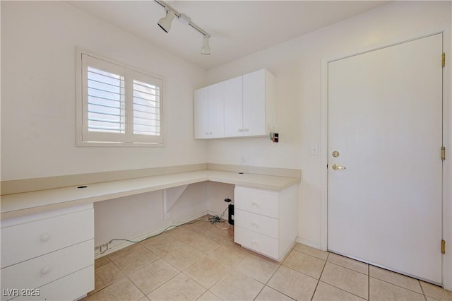 2808 Crown Ridge Dr, Las Vegas, NV 89134 - unfurnished office featuring built in study area, light tile patterned floors, and track lighting