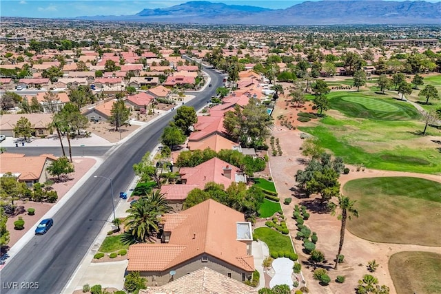 2808 Crown Ridge Dr, Las Vegas, NV 89134 - aerial perspective of suburban area featuring a mountain backdrop and a golf club