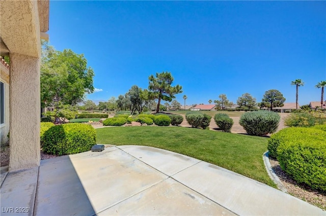 2808 Crown Ridge Dr, Las Vegas, NV 89134 - view of grassy yard featuring a patio area
