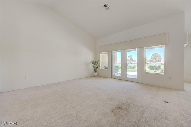 2808 Crown Ridge Dr, Las Vegas, NV 89134 - carpeted spare room featuring vaulted ceiling and french doors