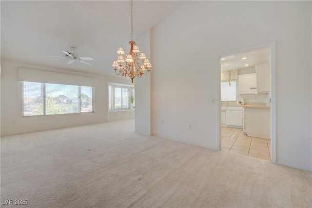 2808 Crown Ridge Dr, Las Vegas, NV 89134 - unfurnished room featuring light carpet, a chandelier, a ceiling fan, vaulted ceiling, and recessed lighting