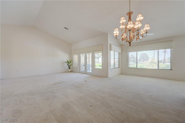 2808 Crown Ridge Dr, Las Vegas, NV 89134 - unfurnished living room featuring lofted ceiling, a chandelier, and carpet