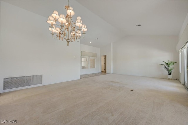 2808 Crown Ridge Dr, Las Vegas, NV 89134 - unfurnished living room featuring a chandelier, lofted ceiling, and light carpet