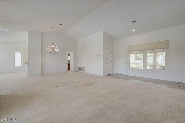 2808 Crown Ridge Dr, Las Vegas, NV 89134 - unfurnished room with a chandelier, high vaulted ceiling, and carpet flooring