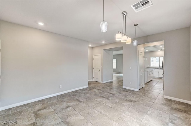 934 Twincrest Ave, North Las Vegas, NV 89032 - spare room featuring baseboards and recessed lighting