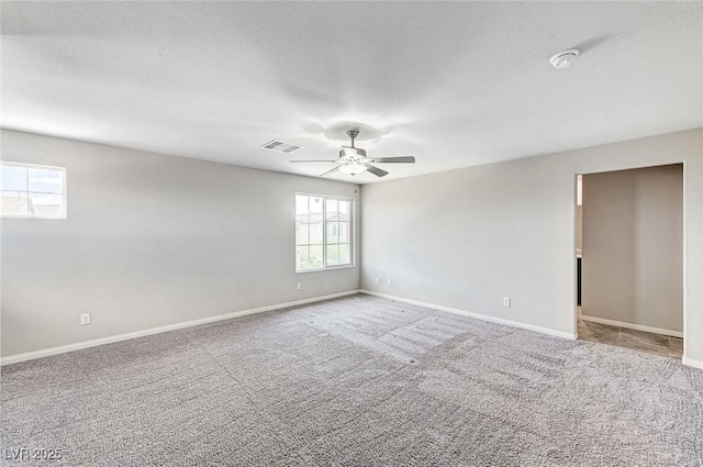 934 Twincrest Ave, North Las Vegas, NV 89032 - spare room with a smoke detector, a ceiling fan, carpet flooring, and a textured ceiling