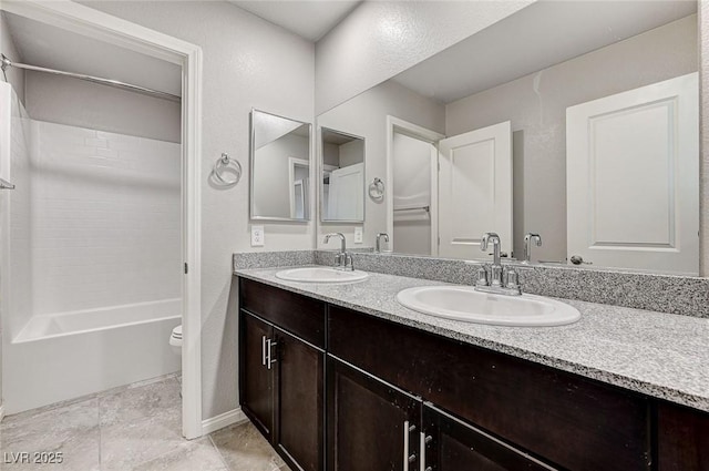 934 Twincrest Ave, North Las Vegas, NV 89032 - bathroom with double vanity and shower / washtub combination