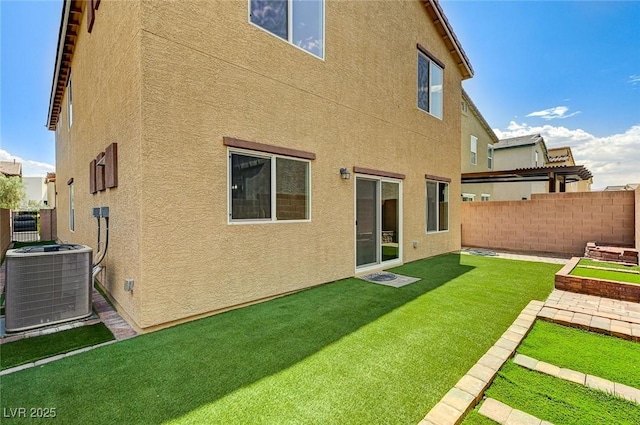 934 Twincrest Ave, North Las Vegas, NV 89032 - back of house featuring stucco siding