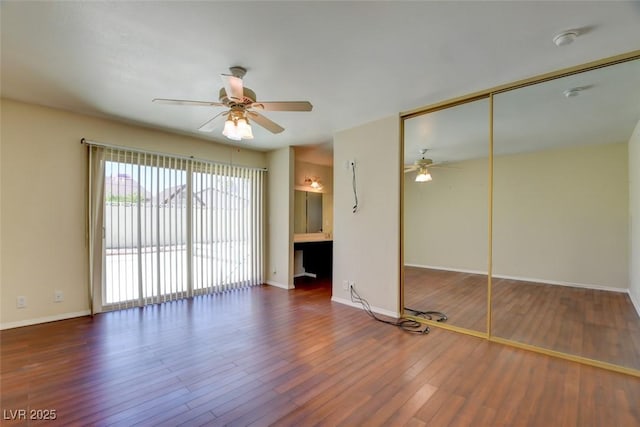 6822 Garden Grove Ave, Las Vegas, NV 89103 - unfurnished living room with a ceiling fan and wood finished floors