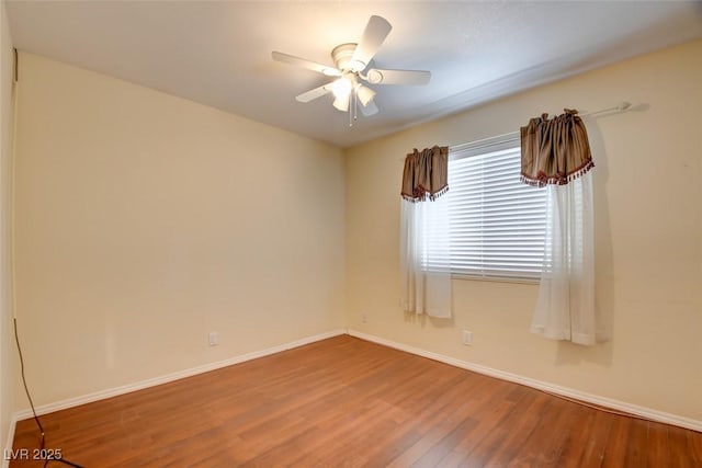 6822 Garden Grove Ave, Las Vegas, NV 89103 - empty room with wood finished floors and a ceiling fan