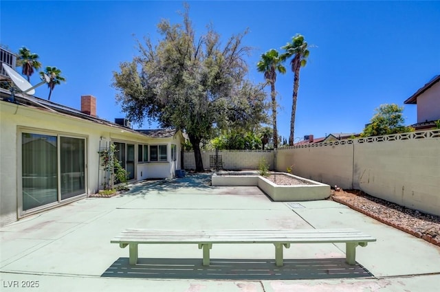 6822 Garden Grove Ave, Las Vegas, NV 89103 - fenced backyard with a patio